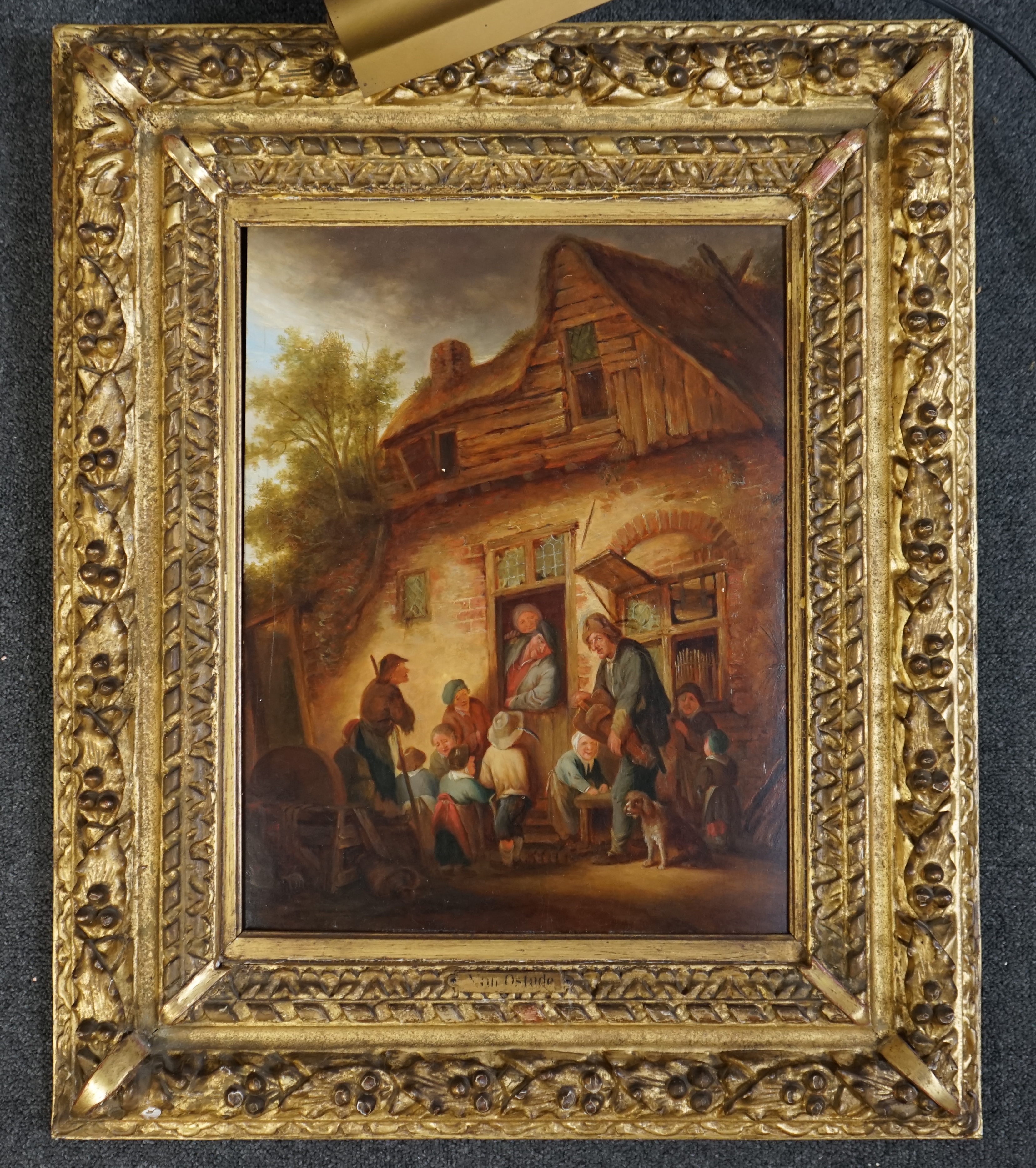 After Adriaen Van Ostade (Dutch, 1610-1685), oil on oak panel, Figures outside a rustic house, 44 x 34cm. Condition - good